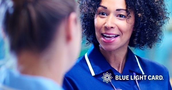 Photo of smiling lady with text: Blue Light Card